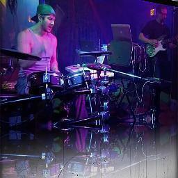 A duo that uses electronic drums and a guitar w/ custom midi capability to create original tunes with influences from Jungle,Funk,Noise,Rock,and the cosmos!!