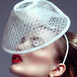 Multi-award winning headwear designer.