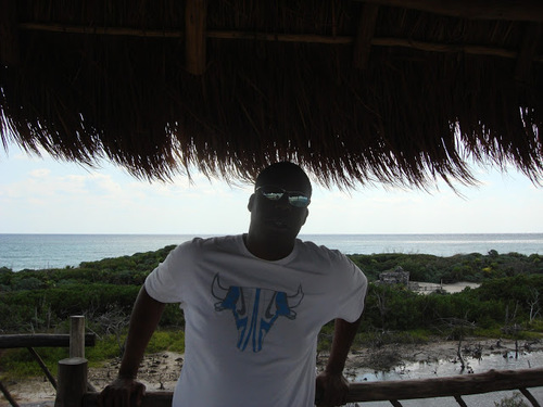 just a black man enjoying what he works for
