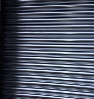Family run business offering high quality industrial strength roller shutters, and steel and insulated garage doors.