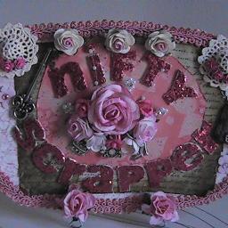 I love scrap booking, homemade items, mixed media and other crafty things