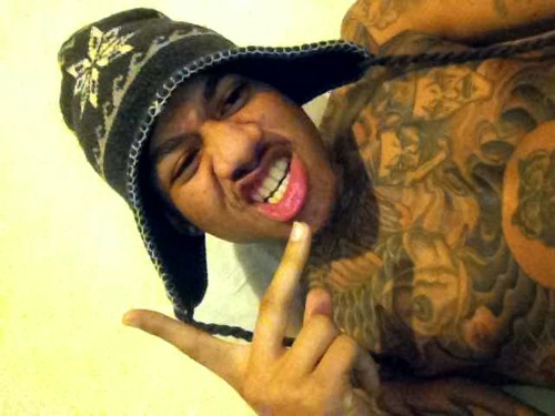 laid back guy , swag , chilling , goofy , charming tatted fuck up ,team mixed , black and indian , love girls ,