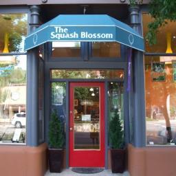 The Squash Blossom, located in historic Old Colorado City, has maintained its reputation for fine art, jewelry, bronze and home accessories, since 1973.
