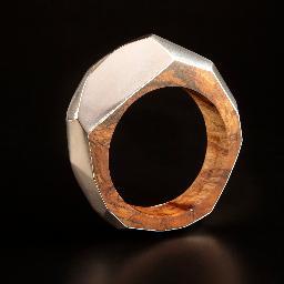 Hand sculpted wood and precious metal jewellery...