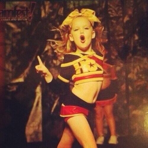 It takes a person with a special gift to be a true cheerleader, but it takes someone with super strength, pride, patience, and heart to be a cheer coach.