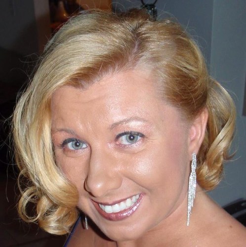 Mom, attorney, basketball fan, movie geek, karaoke queen, world traveller.  =)