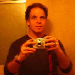 Paul L. Mills aka Poez is a poet-performer in NYC.