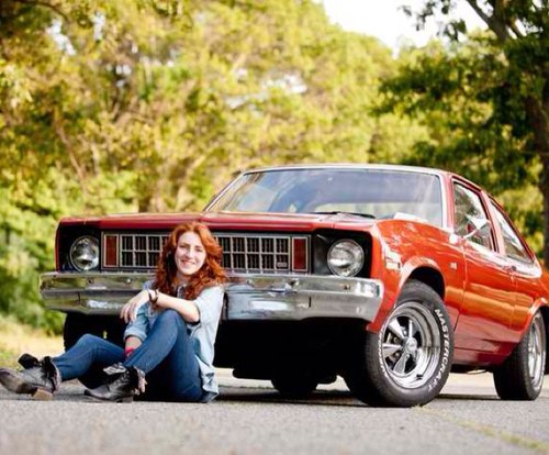 One wild redhead and her handsome 1978 Chevy Nova named Ned are on a mission to find other women out there in the world of cars.