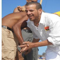 Attorney, human rights activist, university professor, teaching Capoeira Angola for Centro Esportivo de Capoeira Angola of Mestre Joao Grande in Los Angeles.