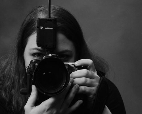 Photographer, student, mother, sister, daughter.