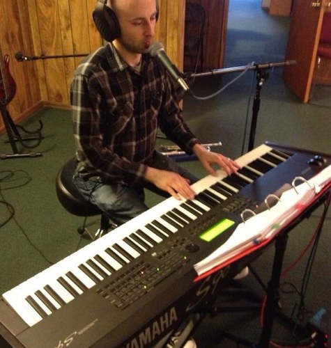 A pastor who really loves his wife and family, the church, batman, and writing music.