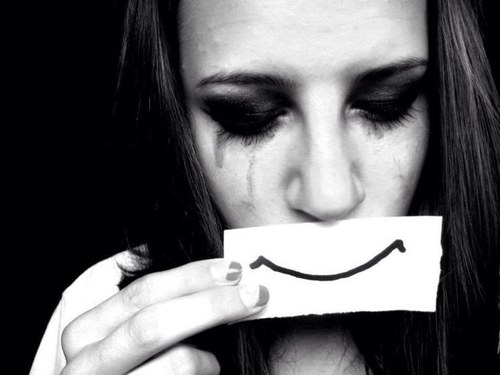 Faking a smile is always easier than explaining why you're sad