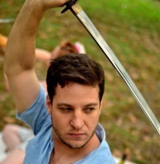 Lover and fighter in equal measure.  Swordsman, producer, epicurean, bon vivant