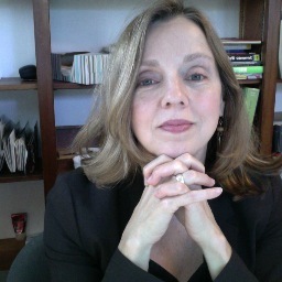 Intelligent Graphic Designer. Energetic. Enterprising. Enthusiastic. Genuinely happy. Mom. Reader. Writer. Lover of languages. Dog person. Aspiring pianist.