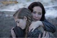 I am The Girl on Fire or The Mocking Jay. I was in the 74 and 75 games. I love Peeta Mellark. Burn you burn with us. Single