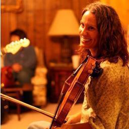classically trained violinist now Texas fiddler. music teacher. part time jazz musician. aspiring master gardener. rescuer of abandoned heirloom bulbs.