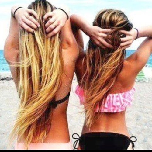 One Brunette & One Blonde tweeting.