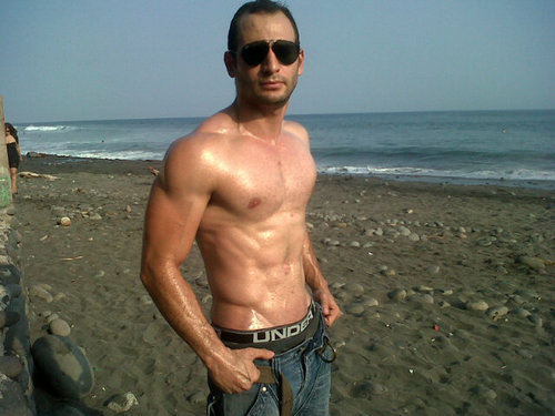 Por mi viviría. En la playa