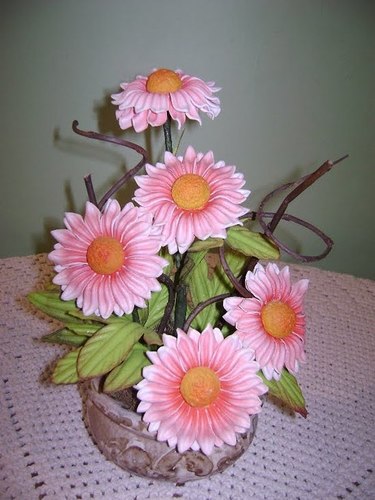 Sou artesã... Confecciono flores em eva 
http://t.co/ow0zIs6zRA
