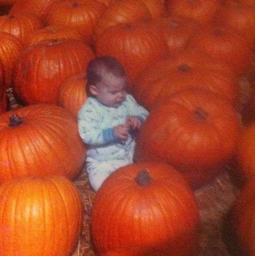 The boy in the pumpkin patch is me.