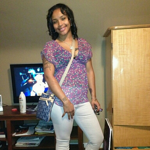 Just living n loving my life minding my buisness so mind yours...loving the hell out my lil family
