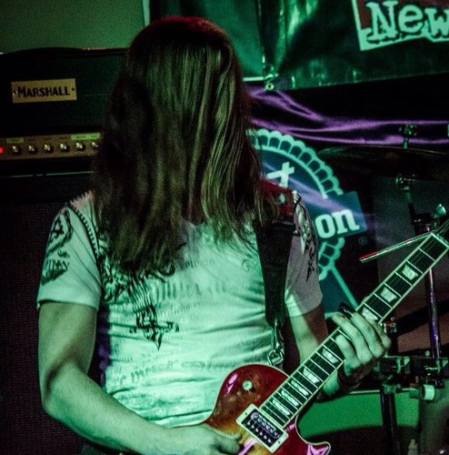 The dude that has long hair and plays the guitar...... yeah, I'm that guy...