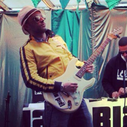 Play guitar for Laid Blak....