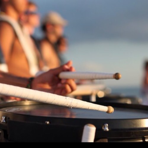 Tweeting about all the perks and pains of being a girl drummer.