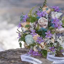 Designer of seashell bouquets for beach, destination, cruise, and seaside weddings.