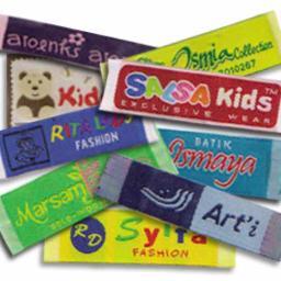 Kami menerima pemesanan Label Baju dengan bahan Woven Damask, Satin Printing, Satin Damask, Nilon Printing, Kartu Nama, Kancing Baju dan Hang Tag
