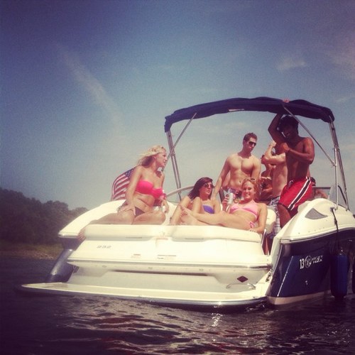 Hailing from the Coraville Lake Marina, This vessel is here only to provide the summer of your dreams.
