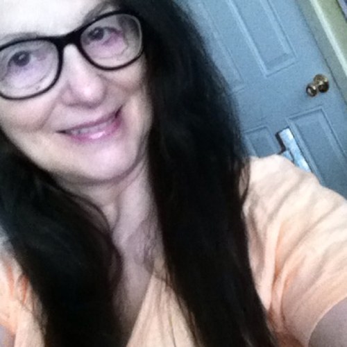 Italian-American. Dark eyes and dark hair. 5'2