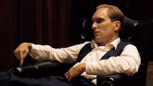 I'm Tom Hagen. I was informally adopted by the Corleone Family. I now work as their lawyer. I'm German-Irish.