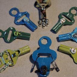 Groovin' designs made from old skate keys. Click the link below to see our latest designs on Etsy. Thanks so much. Have a custom team key made, no set-up fees!