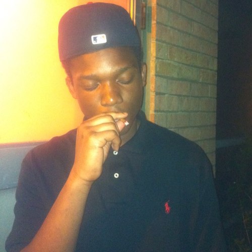 young nigga gettin it. blunt smoker