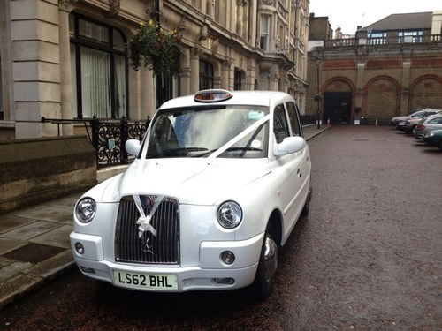 Green badge london taxi driver since 2001 . White tx4. lets up our game & save our glorious trade.