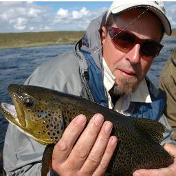 Chaser of wild fish with a stick of graphite and a line -- and wanderer of hills and woods
