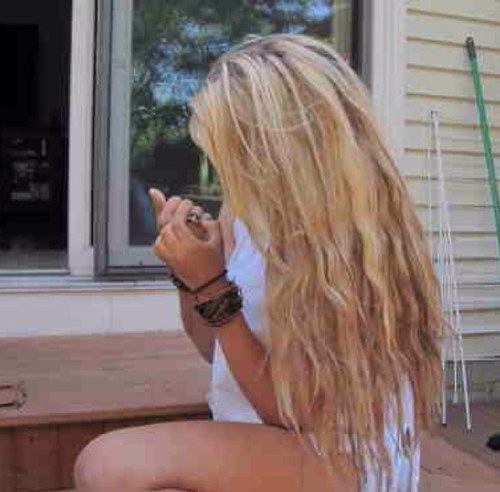 Typical college girl who bitches about bitches, love, and weed.