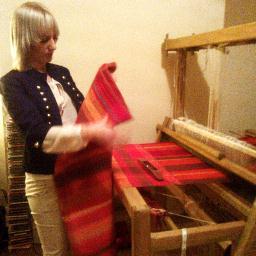 I'm a textile designer who's working on a hand loom creating new and unseen home things, textiles using my own hand woven fabrics and textiles.