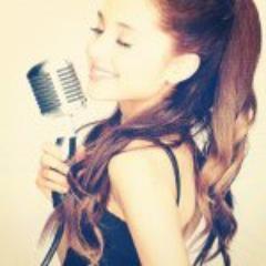 Red Lipstick, Pink hair bows, sings songs on telivison shows, Puffy Dresses perfect smile, we put our hearts up , Ariana Style! 
(09/12/11 Ariana followed)