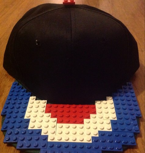 A unique clothing/accessory company offering personalised and custom items designed with embroidery and plastic bricks!
No conection to lego 
this is not a toy