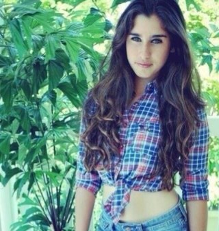 Yo! The name's Lauren, Lauren Jauregui. I'm a freshman, 15 years young. Uh.. I love to dance, sing, and party. K bye.