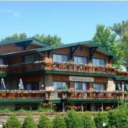 The family-owned Best Western Adirondack Inn in Lake Placid, New York just across the street from the Olympic Center and next to Mirror Lake Beach.