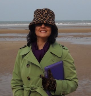 Christian mom, wife, teacher, francophile, bovine lover, amateur knitter, Grover aficionado, and lover of laughter.