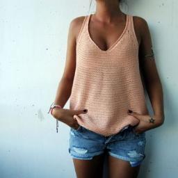Smile in her lips, cuts on her wrist.                                                       Stay Strong.