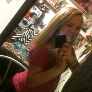 well....i have blonde hair...blue eyes.....im 12.......i go to bridge street middle school!!:)33