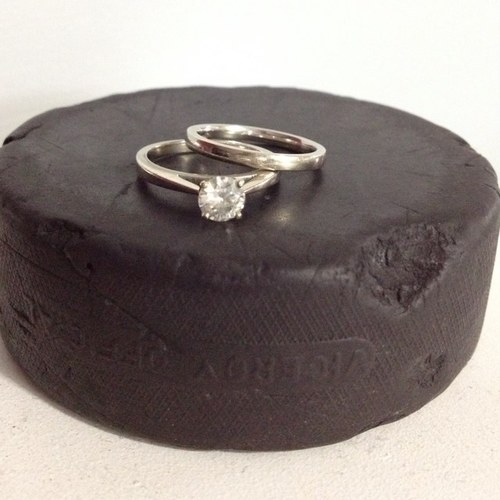 Coach's wife, hockey mom, occasional team manager, teacher!