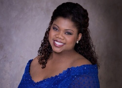 A voice described as Warm, Sultry, & Fierce; Operatic Soprano with a strong penchant for electronic gadgets, civic engagement, inspirational quotes & shoes. ;o)