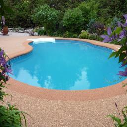 Rubaroc BC specializing in residential and commercial rubber resurfacing of pool decks, patios, stairs, pathways and garage floors.