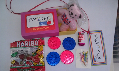 We are twin sisters and mums of one. We make sliding boxes and fill them with treats. For 3 - 103!  Free personalisation - perfect for kid's parties!
